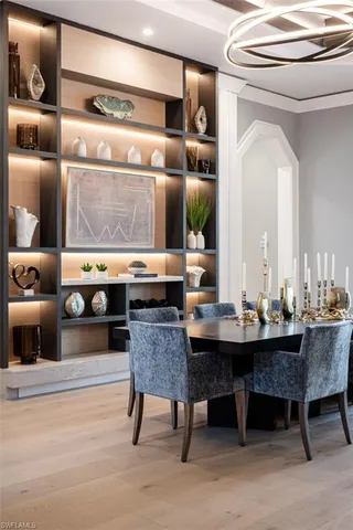 a dining table with chairs and a table