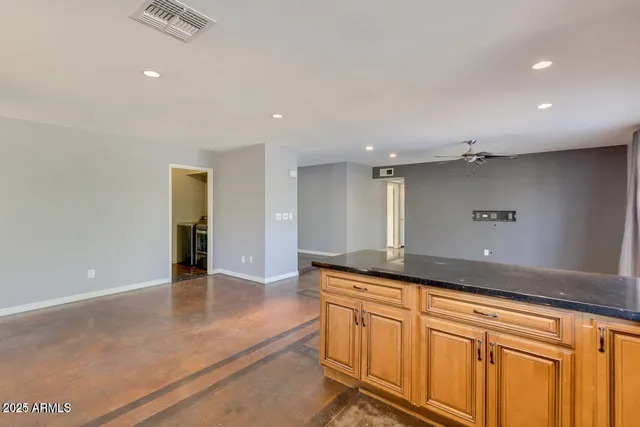 a view of a kitchen with a sink and a dishwasher