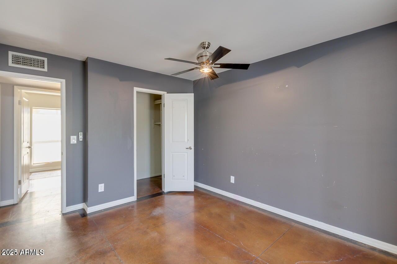 3832 East Bloomfield Road Phoenix, AZ 85032 - Photo 16 of 32 wooden floor in an empty room and a window