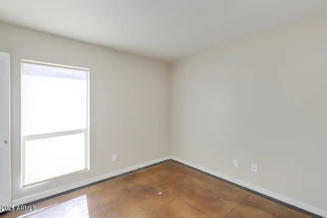 an empty room with a window