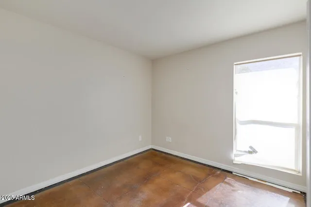 an empty room with a window