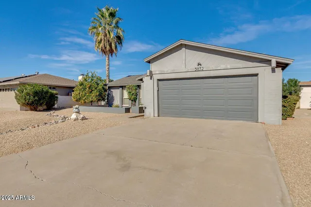 a view of a house with a garage