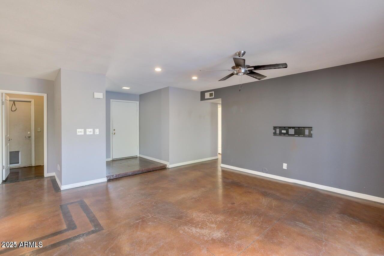 3832 East Bloomfield Road Phoenix, AZ 85032 - Photo 4 of 32 a view of an empty room and window