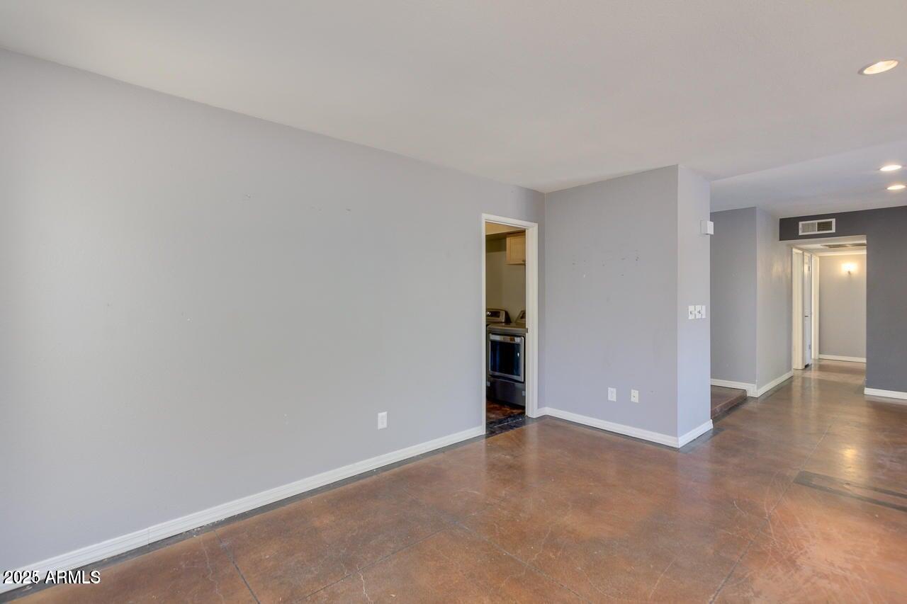 3832 East Bloomfield Road Phoenix, AZ 85032 - Photo 9 of 32 a view of an empty room and closet area