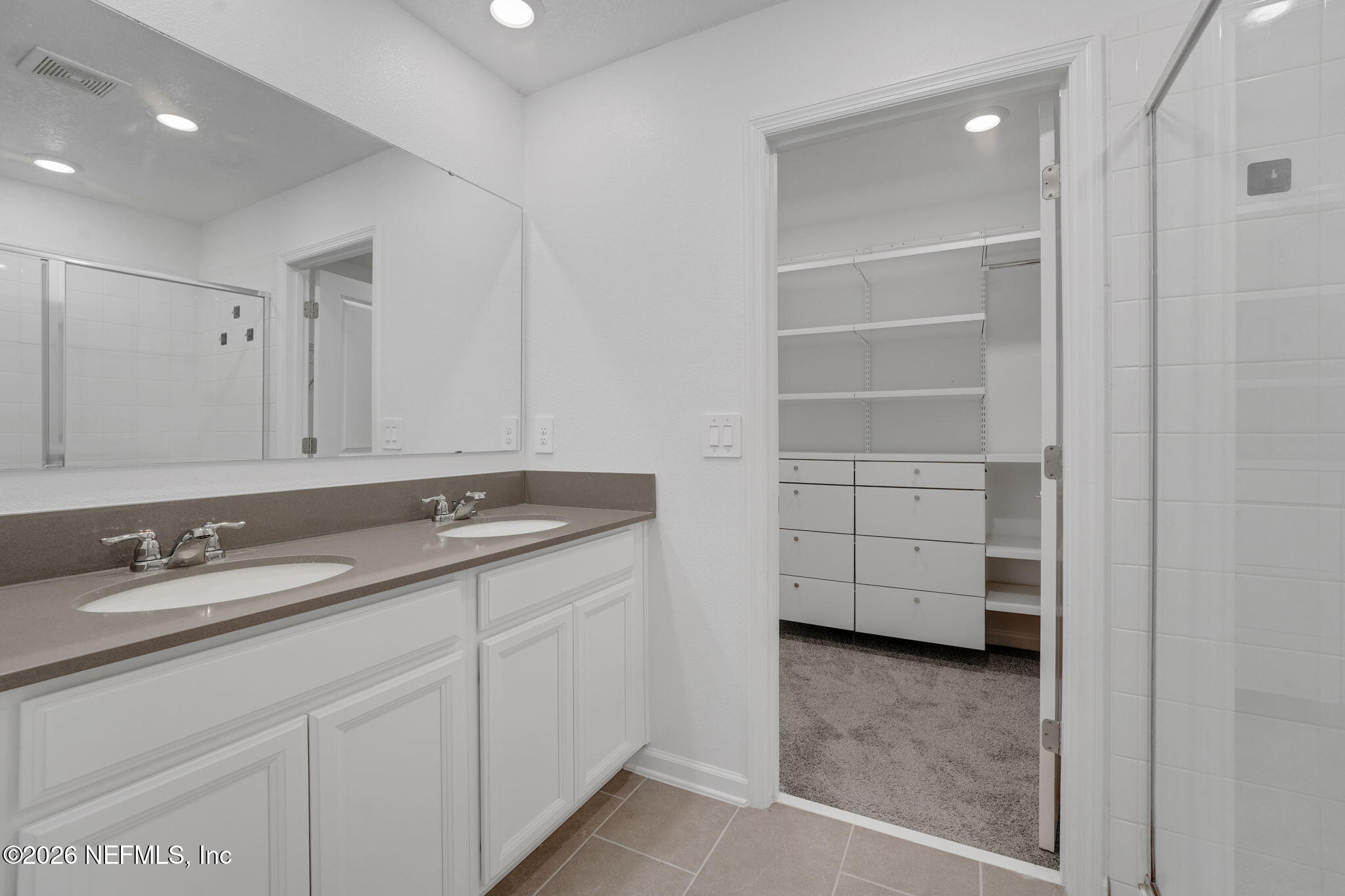 1214 Fury Street Davenport, FL 33837 - Photo 11 of 37 a bathroom with a sink and a mirror