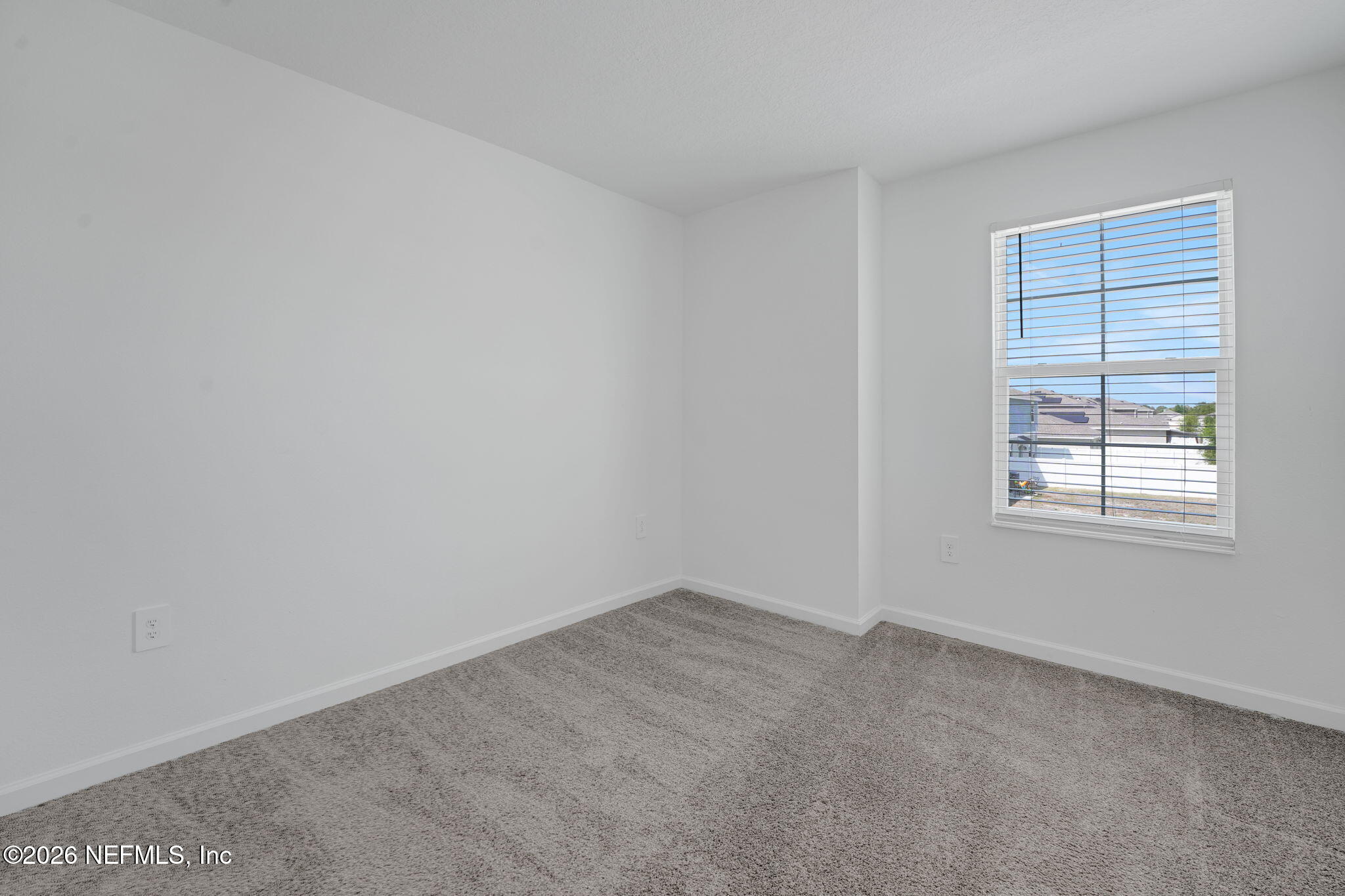 1214 Fury Street Davenport, FL 33837 - Photo 17 of 37 an empty room with windows