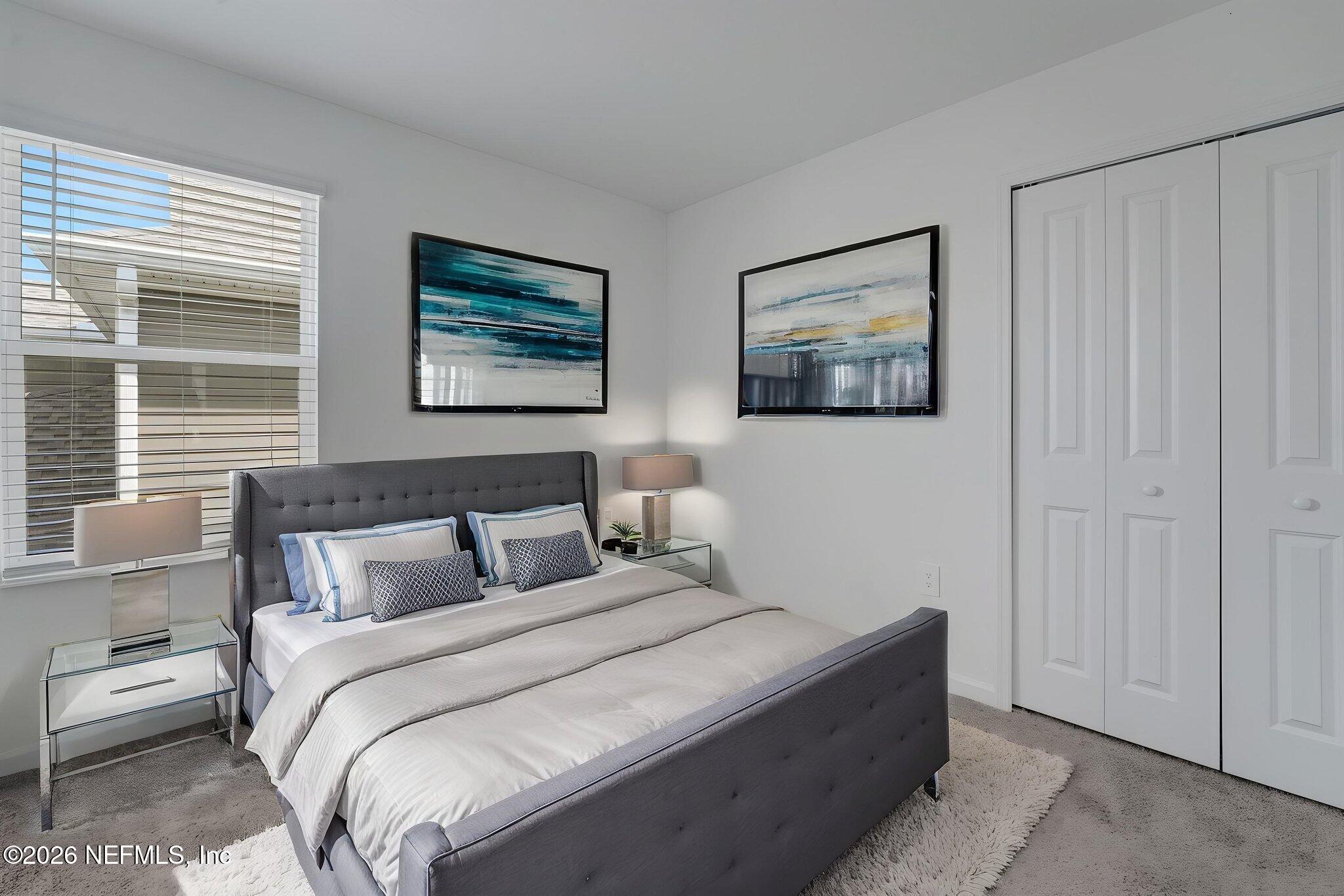 1214 Fury Street Davenport, FL 33837 - Photo 18 of 37 a bedroom with bed and window
