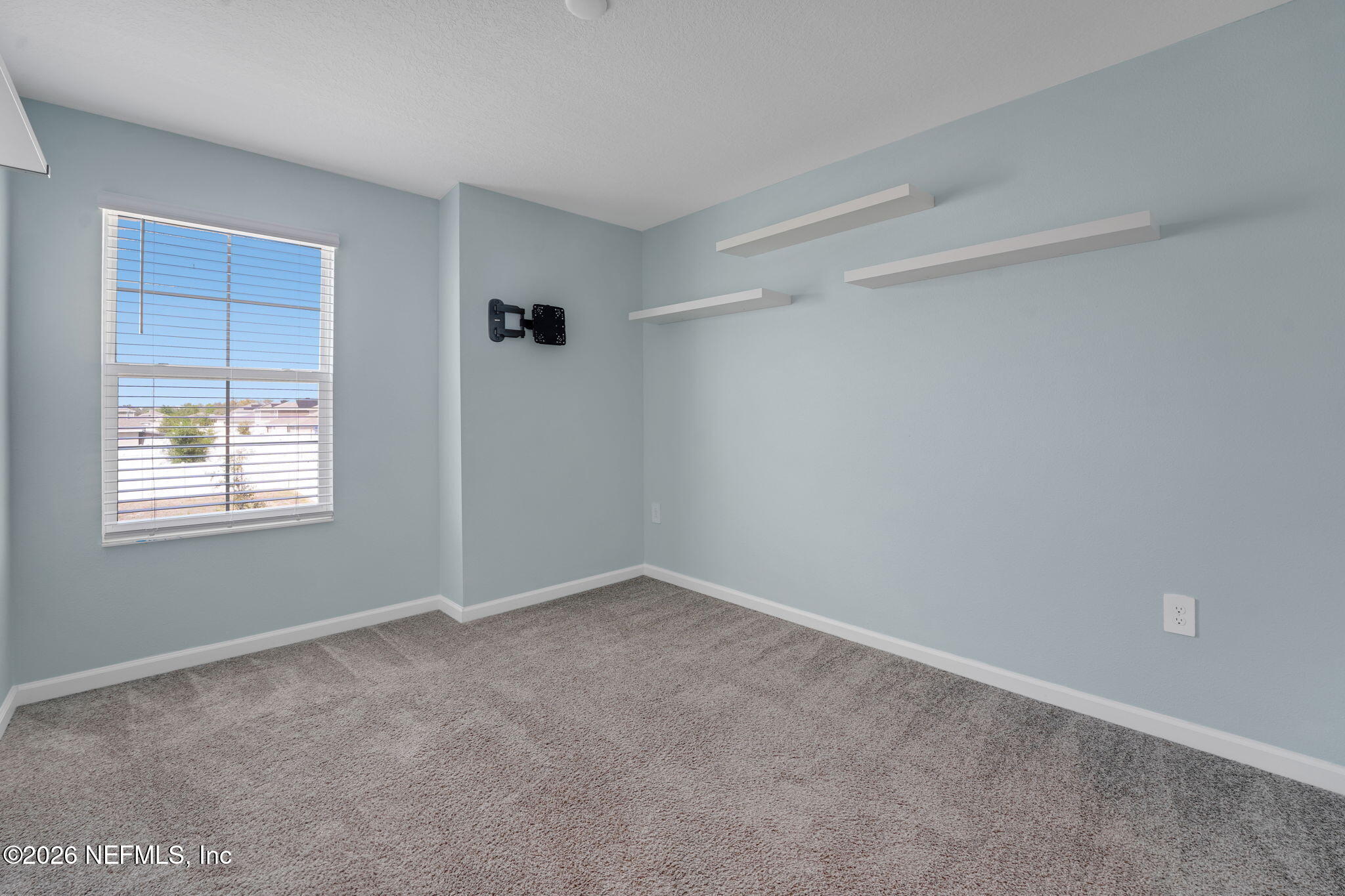 1214 Fury Street Davenport, FL 33837 - Photo 21 of 37 an empty room with windows
