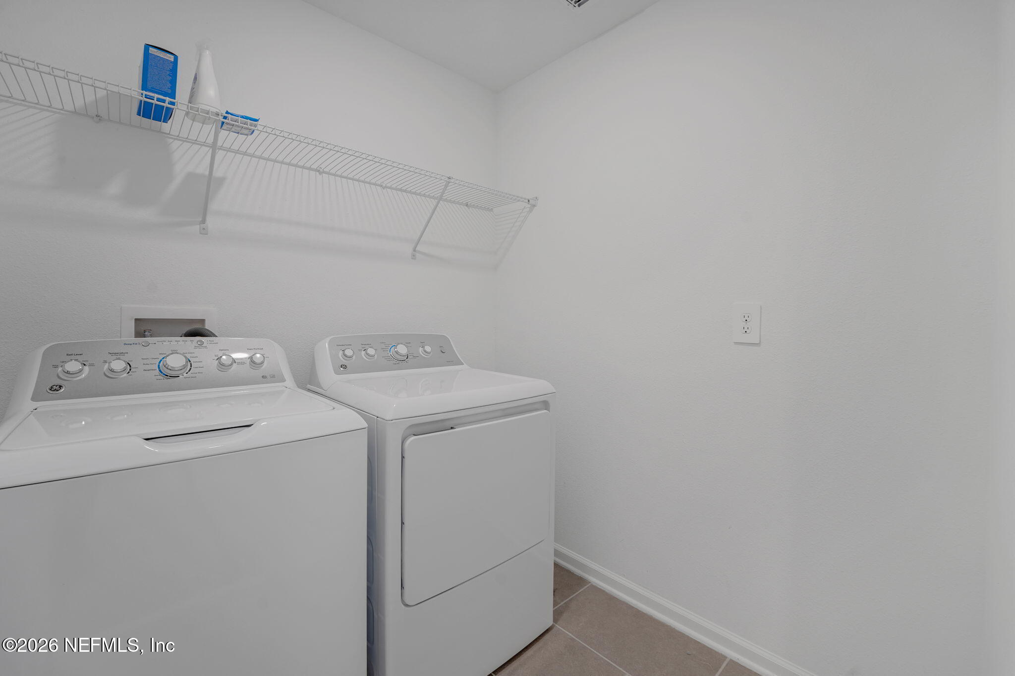1214 Fury Street Davenport, FL 33837 - Photo 24 of 37 a utility room with dryer and washer