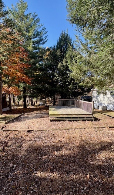2-251 Woodhaven Sublette, IL 61367 - Photo 2 of 5 a view of a yard with an trees