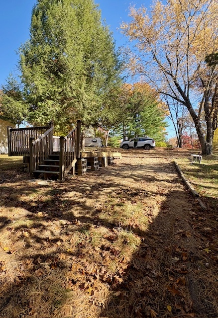 2-251 Woodhaven Sublette, IL 61367 - Photo 3 of 5 a view of outdoor space with deck and trees