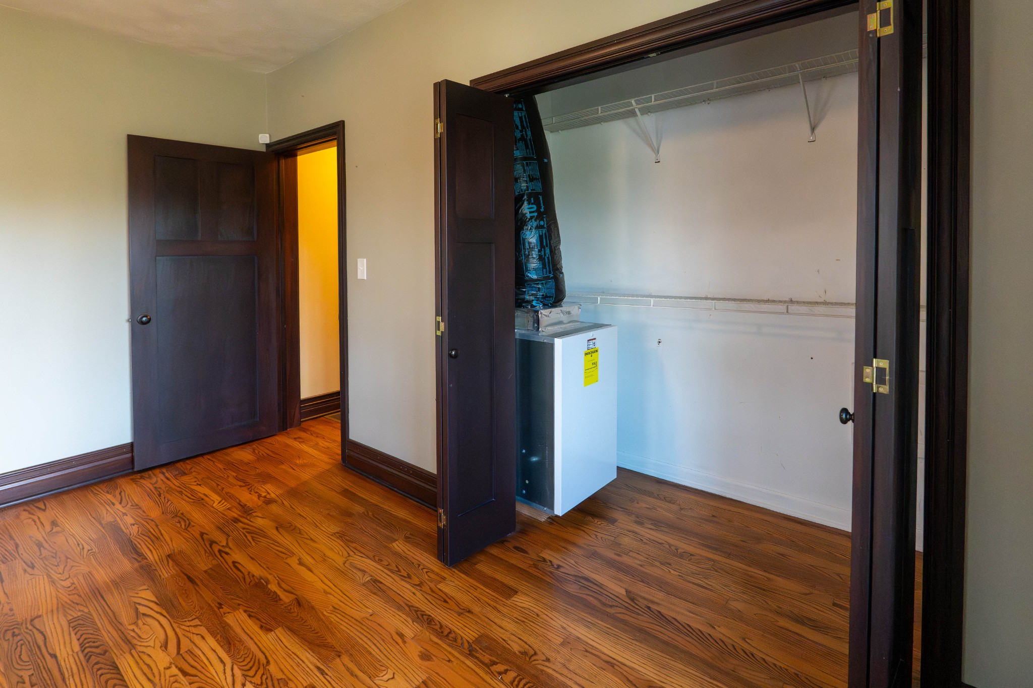 510 Rosebower Church Road Paducah, KY 42003 - Photo 27 of 52 a view of an empty room with closet and wooden floor