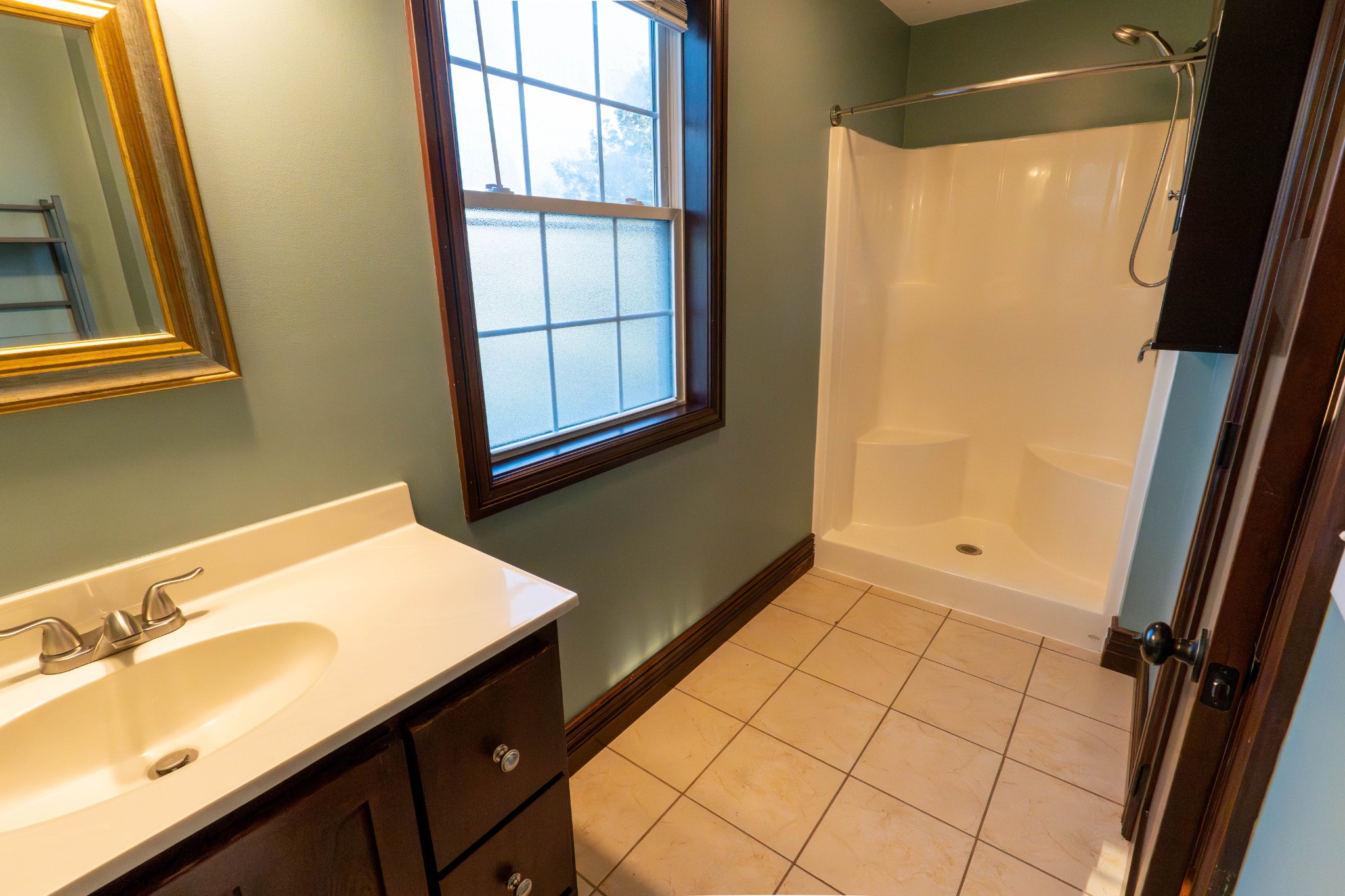 510 Rosebower Church Road Paducah, KY 42003 - Photo 30 of 52 a bathroom with a sink and a mirror