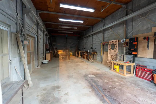 a view of empty room with wooden ceiling