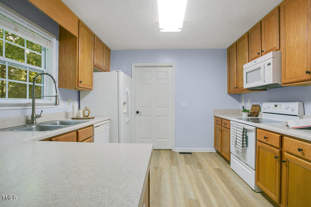 6205 Silver Spring Court Willow Spring, NC 27592 - Photo 9 of 32 Kitchen 3