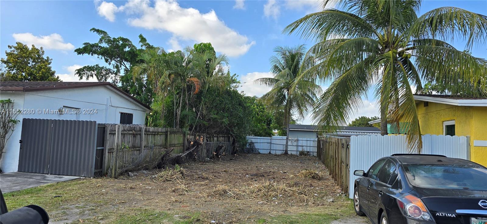 184 Eureka Miami, FL 33177 - Photo 13 of 13 a backyard of a house with barbeque oven table and chairs