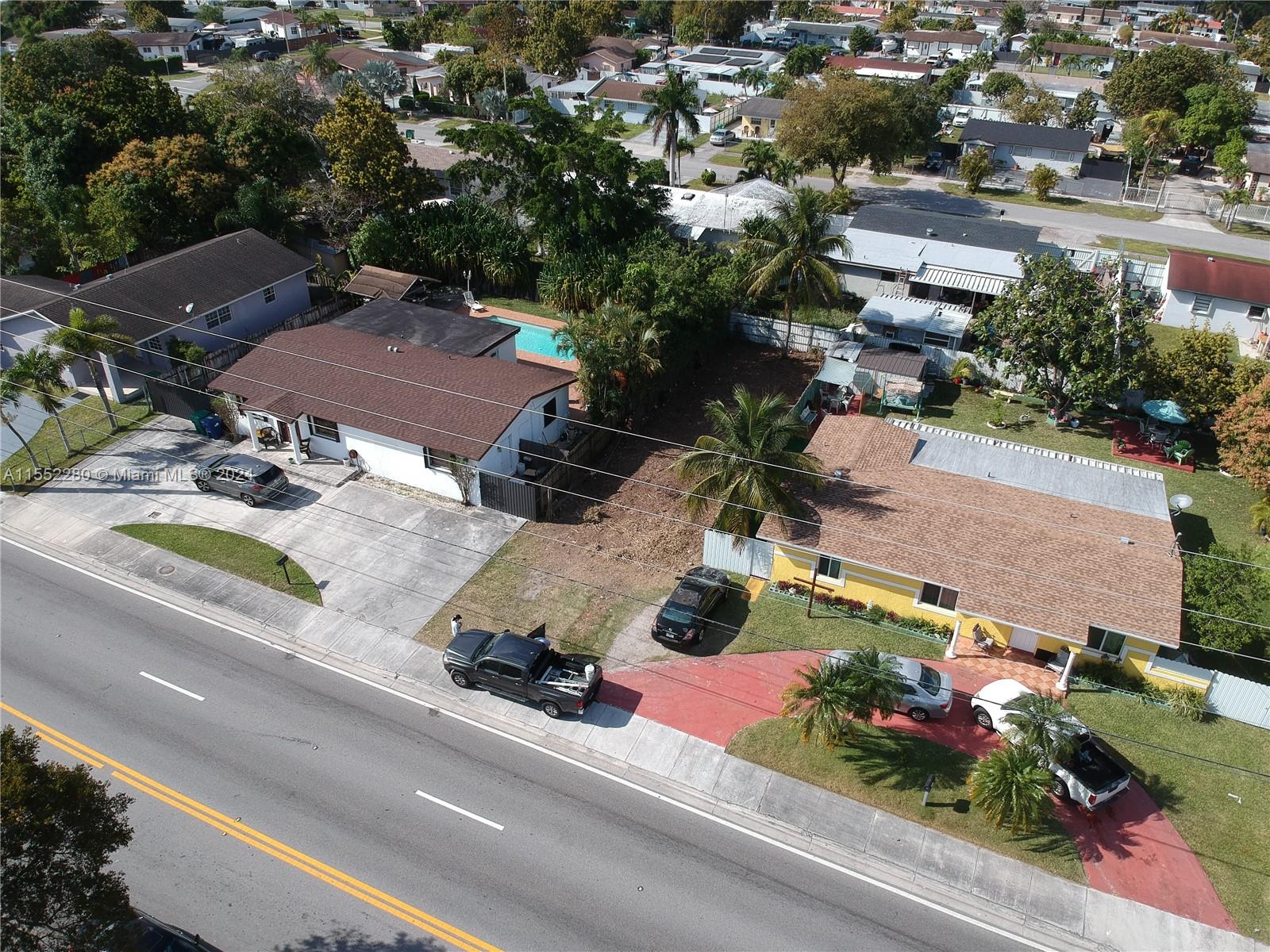 184 Eureka Miami, FL 33177 - Photo 5 of 13 an aerial view of multiple houses with yard