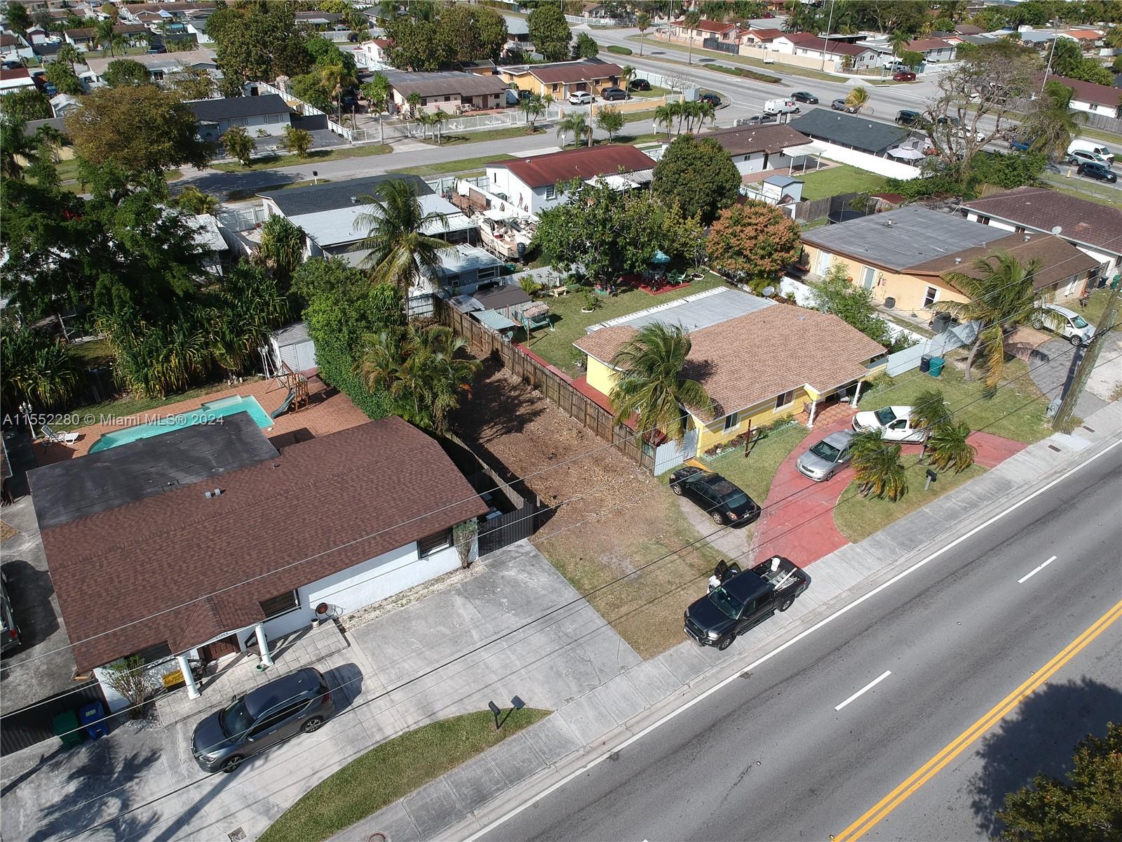 184 Eureka Miami, FL 33177 - Photo 6 of 13 an aerial view of residential houses with outdoor space