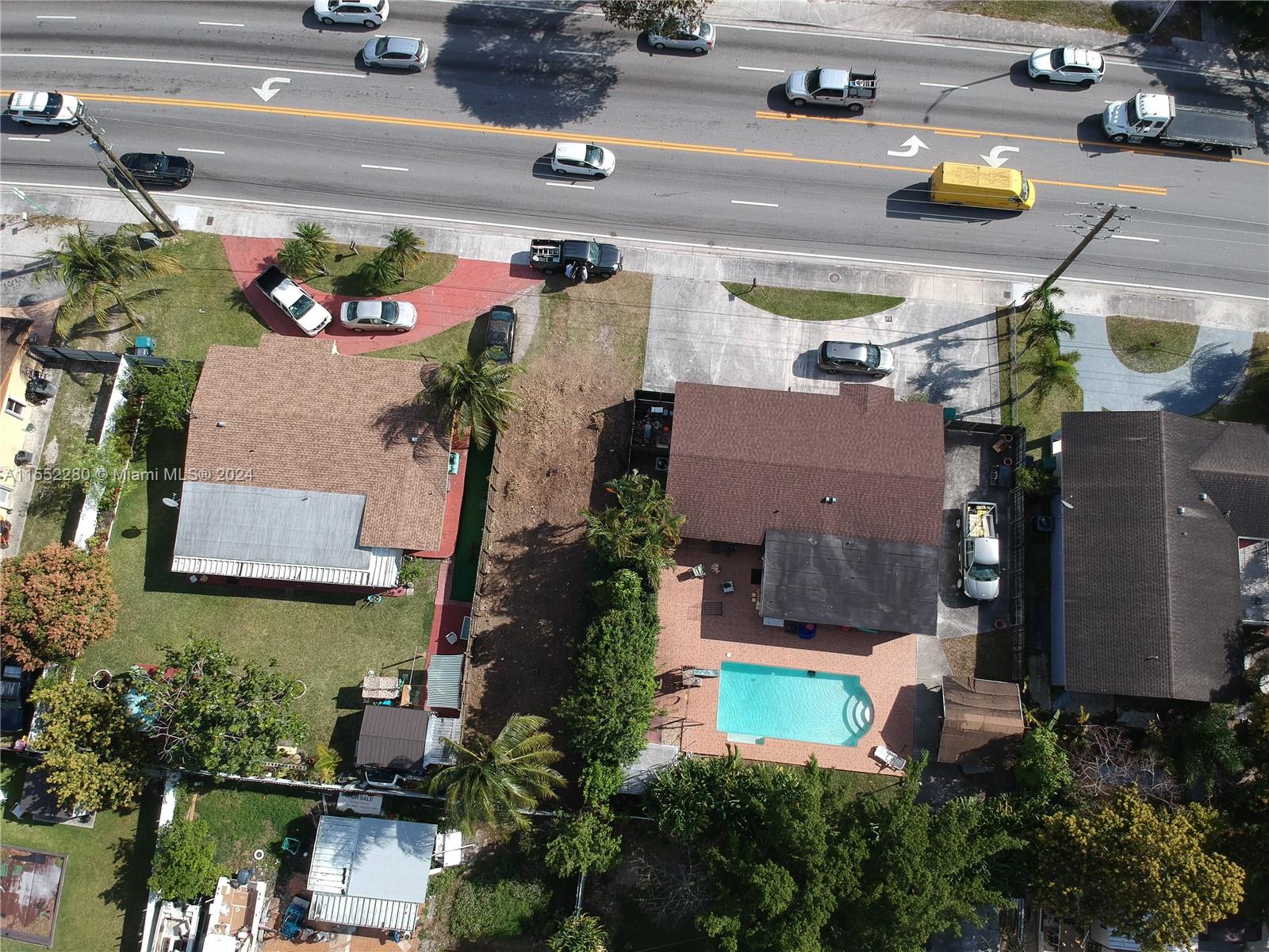 184 Eureka Miami, FL 33177 - Photo 7 of 13 an aerial view of multiple houses with outdoor space