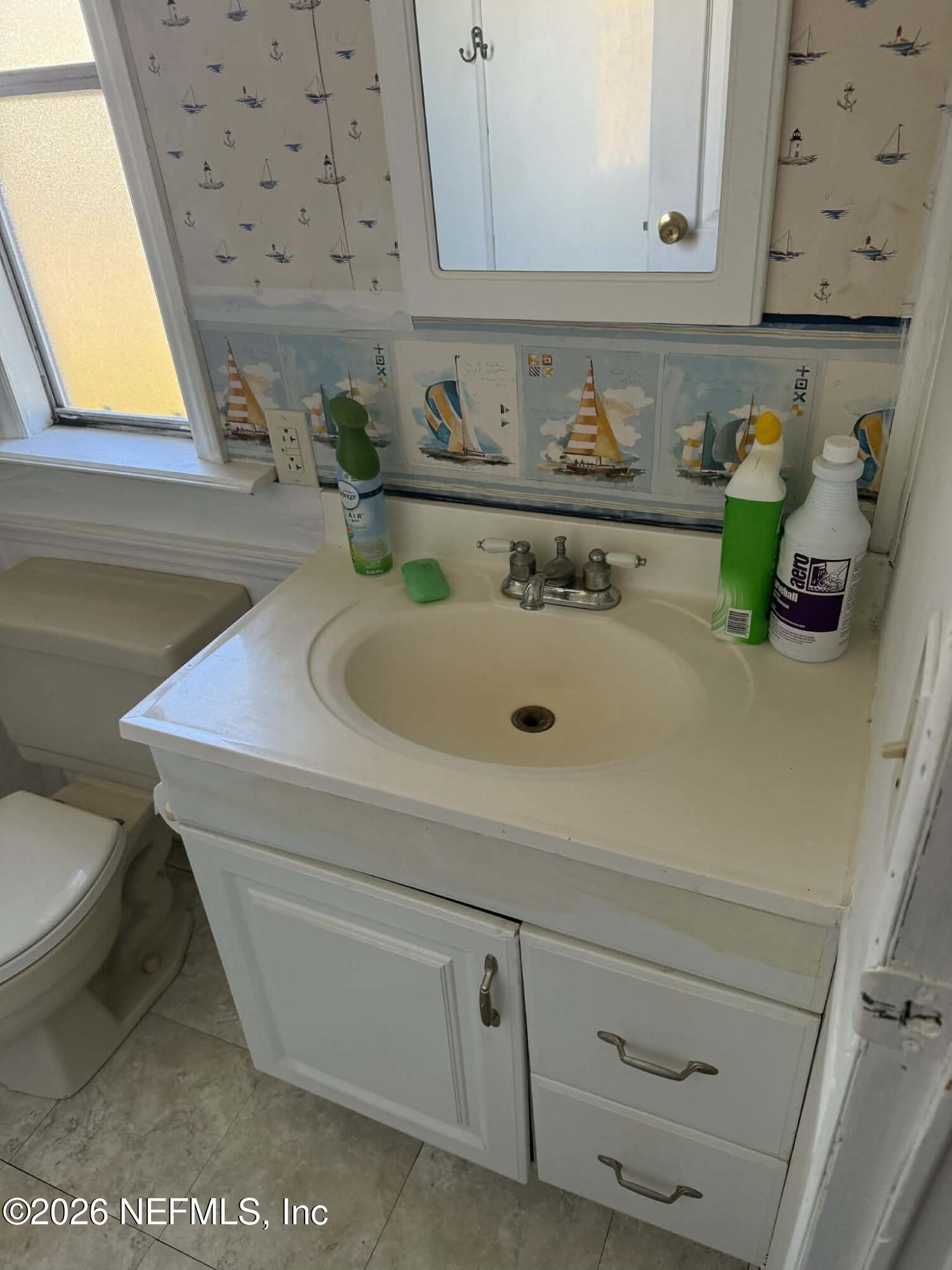 133 Sportsman Road Satsuma, FL 32189 - Photo 12 of 45 a bathroom with a sink and a toilet