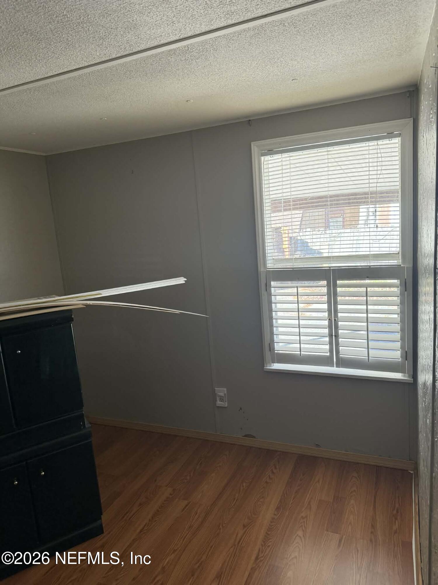 133 Sportsman Road Satsuma, FL 32189 - Photo 16 of 45 a view of an empty room with a window