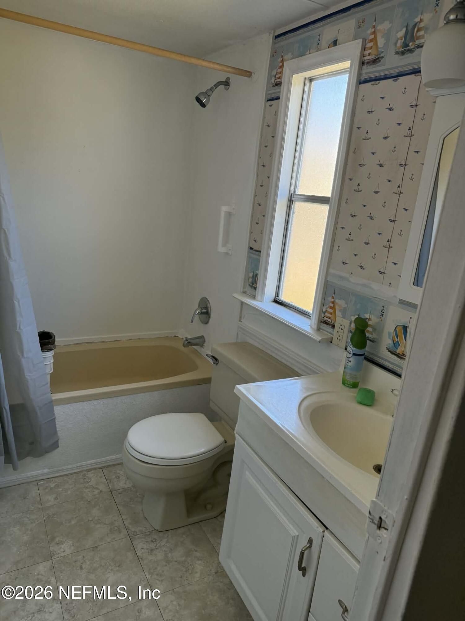 133 Sportsman Road Satsuma, FL 32189 - Photo 17 of 45 a bathroom with a sink a toilet and a bathtub