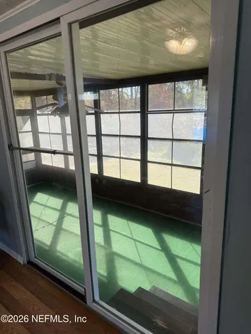 a picture of a building with a yard