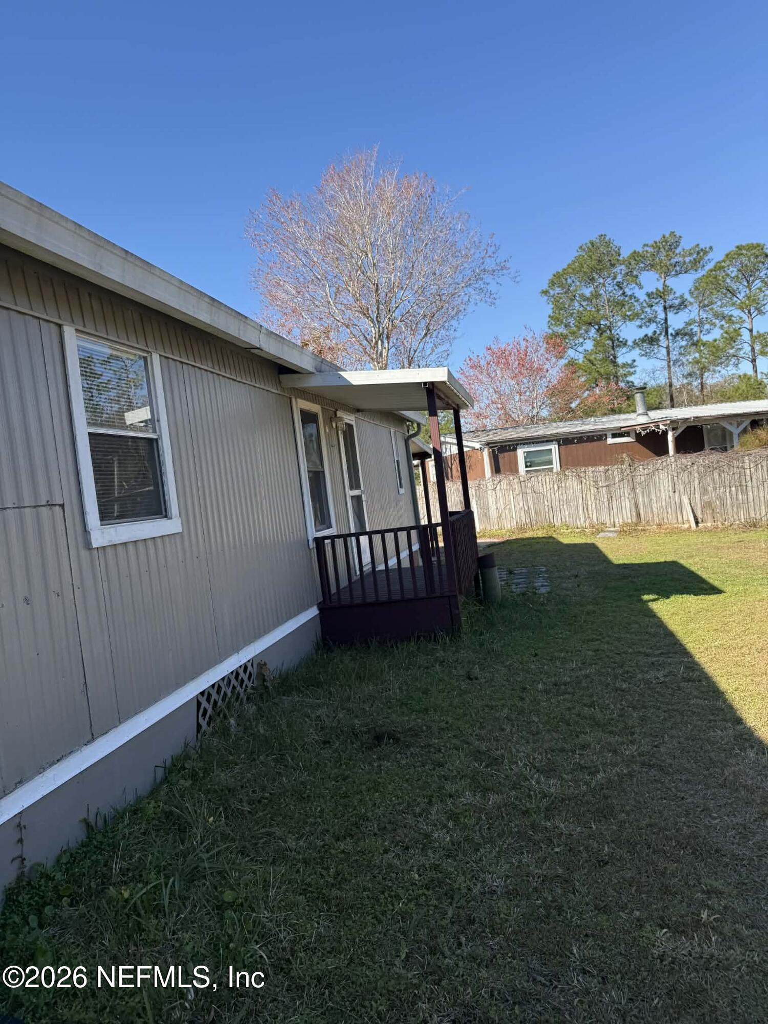 133 Sportsman Road Satsuma, FL 32189 - Photo 4 of 45 a view of a house with a yard