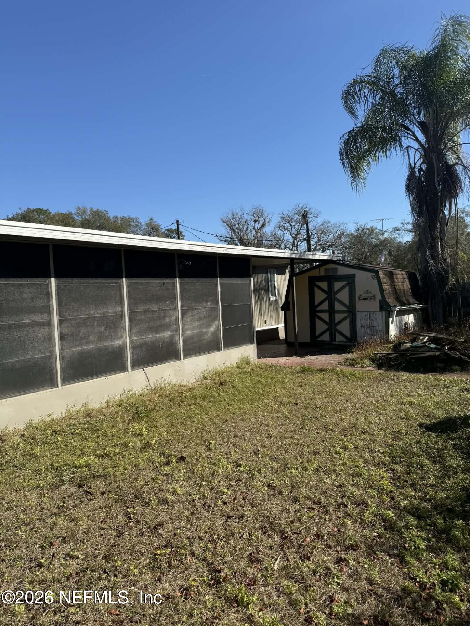 133 Sportsman Road Satsuma, FL 32189 - Photo 43 of 45 a view of a house with a yard