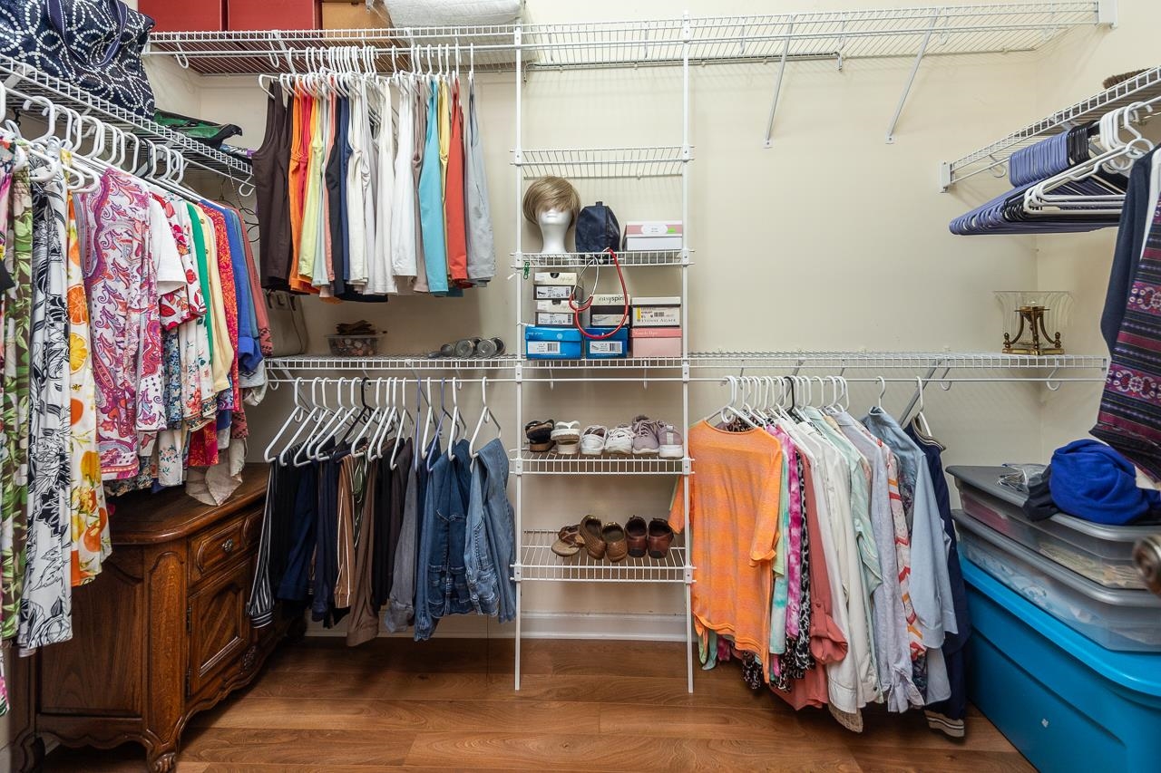 6031 Grayce Drive Bartlett, TN 38134 - Photo 16 of 31 a view of walk in closet with clothes and shoes