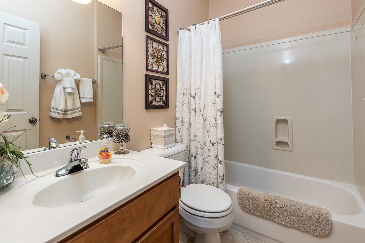 6031 Grayce Drive Bartlett, TN 38134 - Photo 19 of 31 a bathroom with a sink toilet and shower