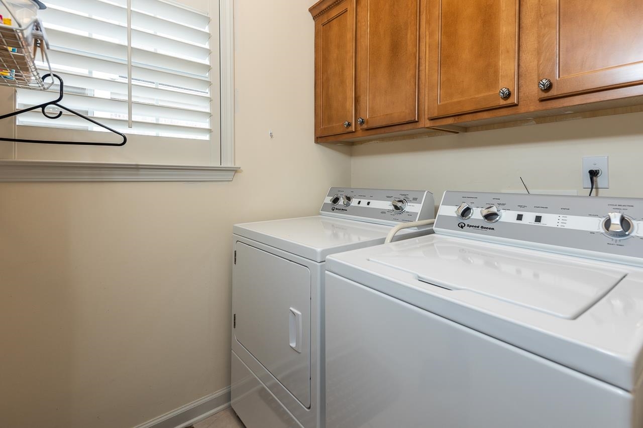 6031 Grayce Drive Bartlett, TN 38134 - Photo 20 of 31 a utility room with dryer and washer