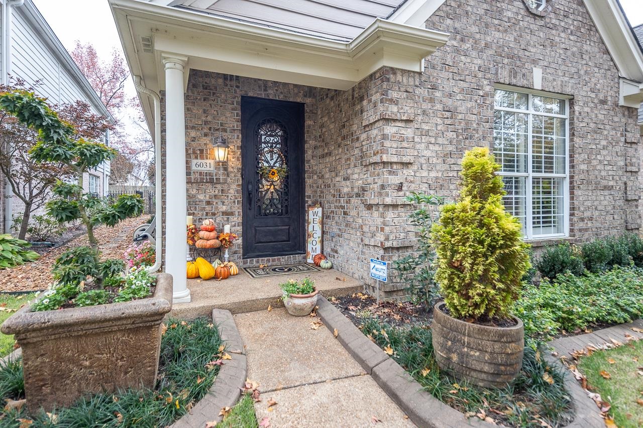 6031 Grayce Drive Bartlett, TN 38134 - Photo 2 of 31 a view of a house with a backyard and a fountain