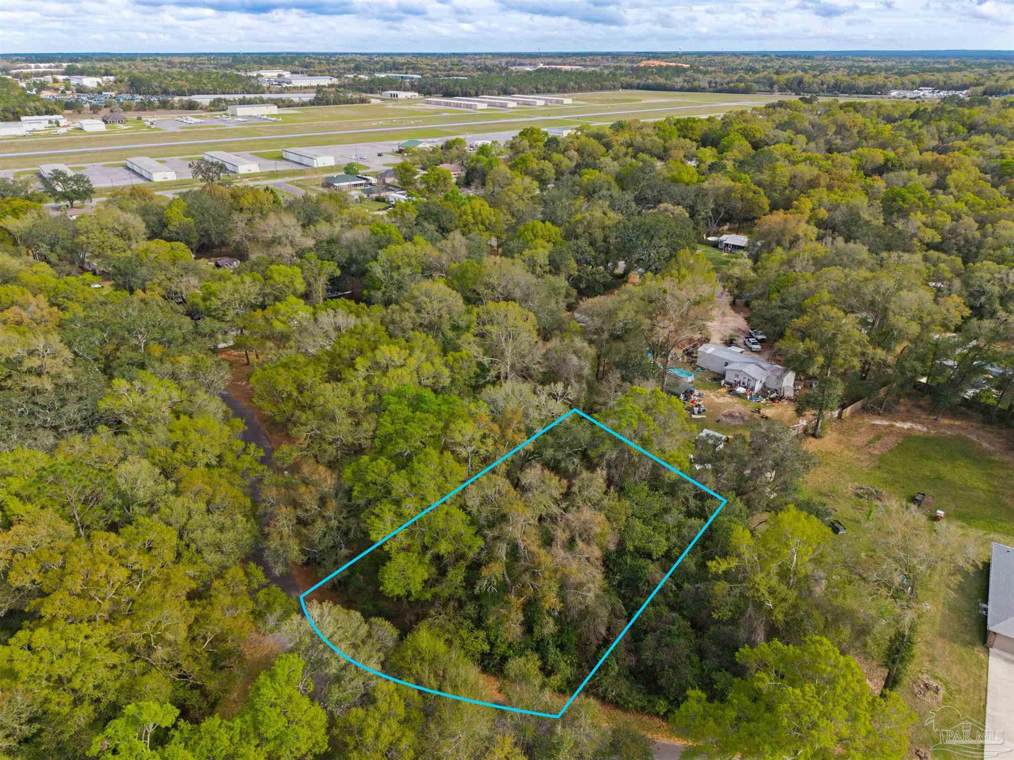 7725 Elrod Road Milton, FL 32583 - Photo 5 of 16 a view of a swimming pool and an outdoor space