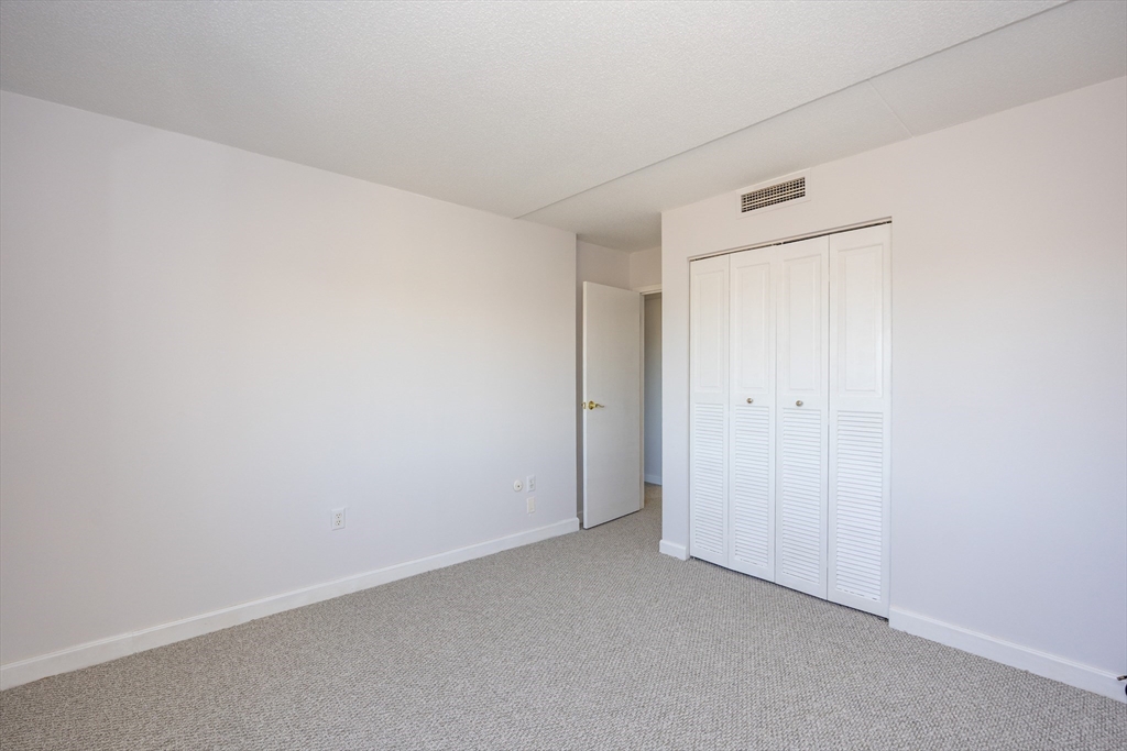 73 Broad Reach, Unit M21C Weymouth, MA 02191 - Photo 14 of 39 a view of an empty room