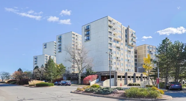 a front view of a building with street view