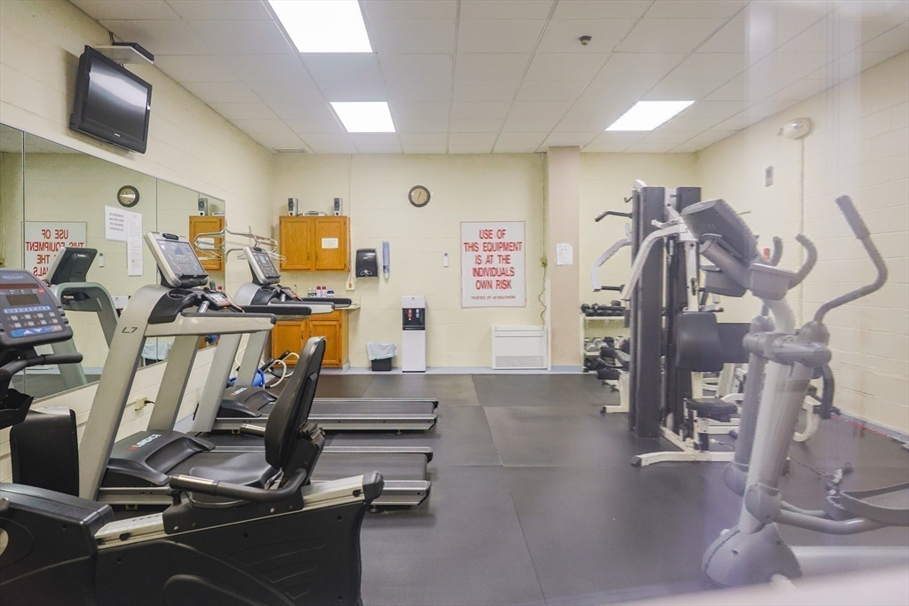 73 Broad Reach, Unit M21C Weymouth, MA 02191 - Photo 33 of 39 a view of a room with gym equipment