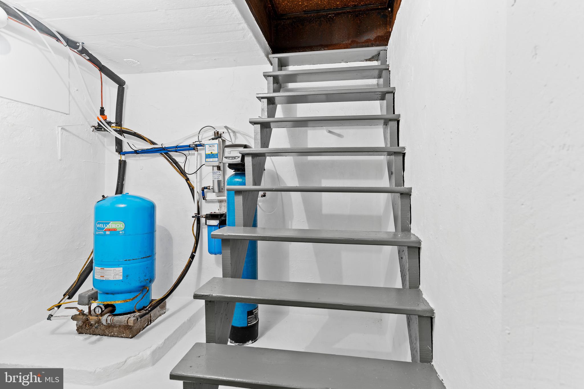 2123 Ritner Highway Carlisle, PA 17015 - Photo 47 of 72 Well tank & water treatment room w/steps to patio