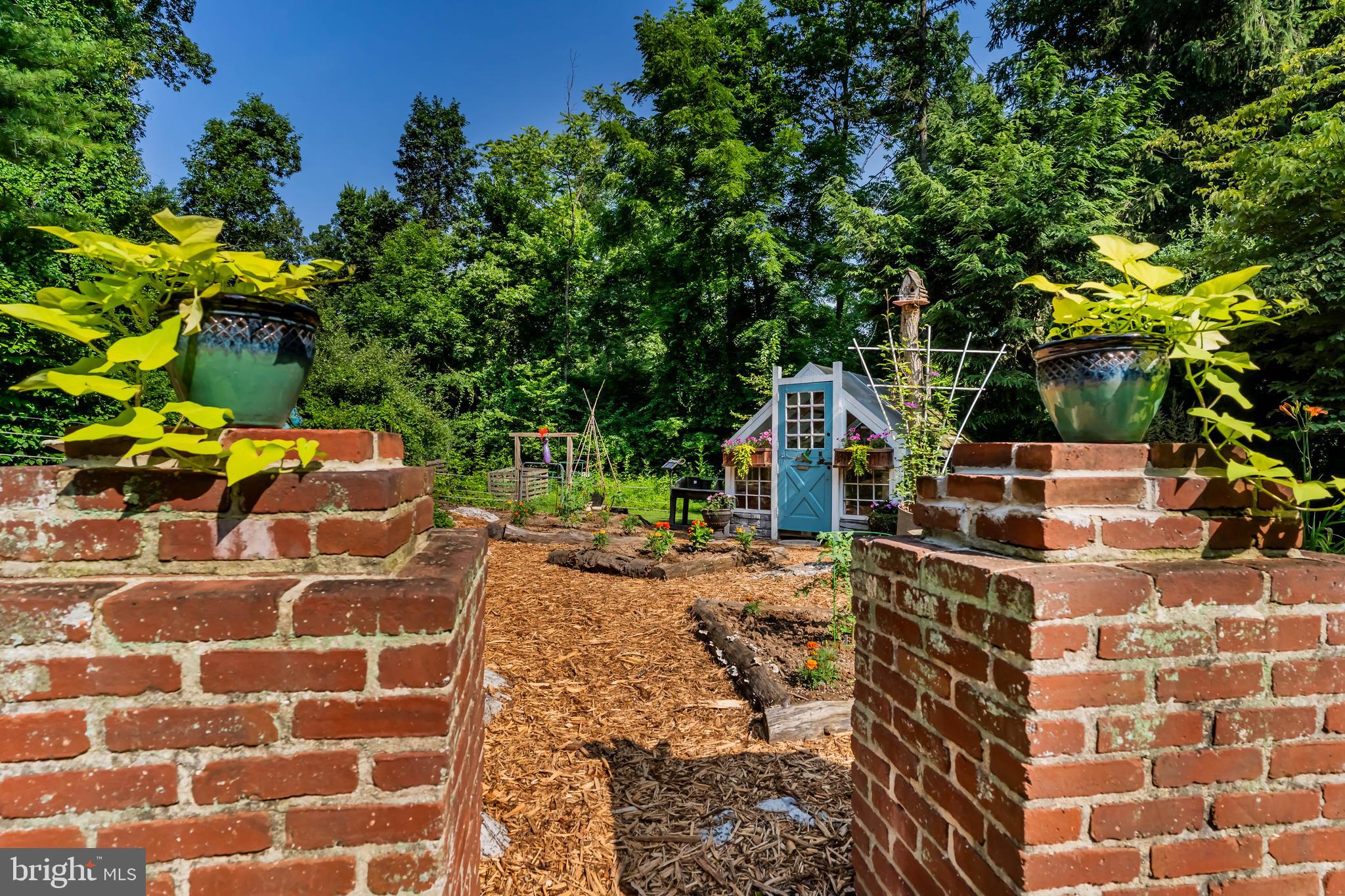 2123 Ritner Highway Carlisle, PA 17015 - Photo 52 of 72 Brick columns invite you to the greenhouse