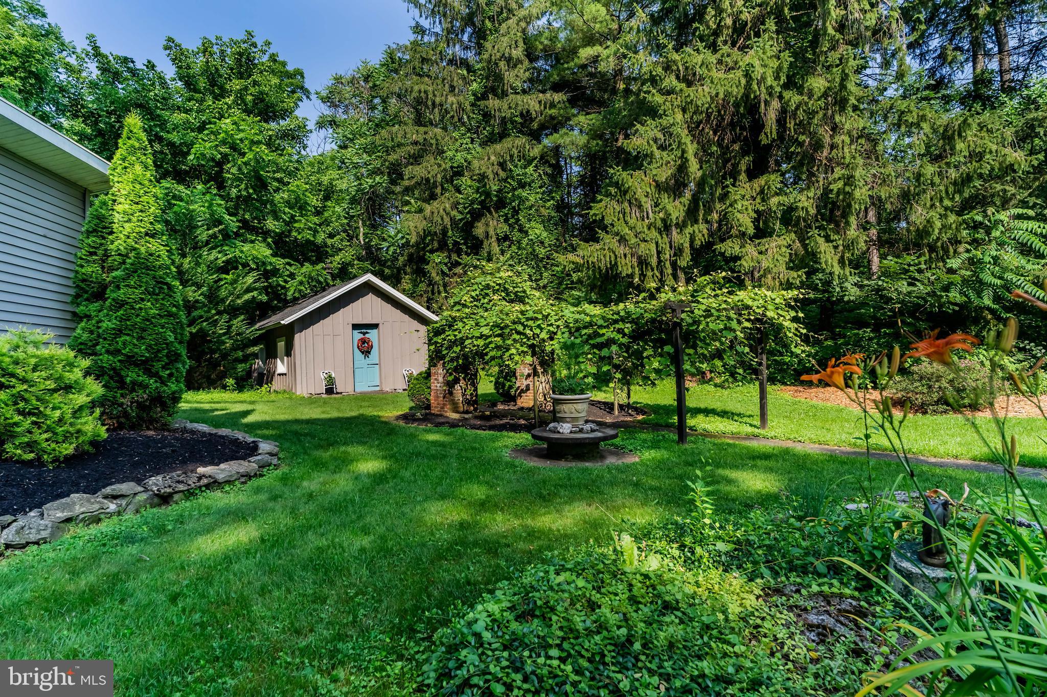 2123 Ritner Highway Carlisle, PA 17015 - Photo 60 of 72 Original shed is the backdrop to the grape arbors