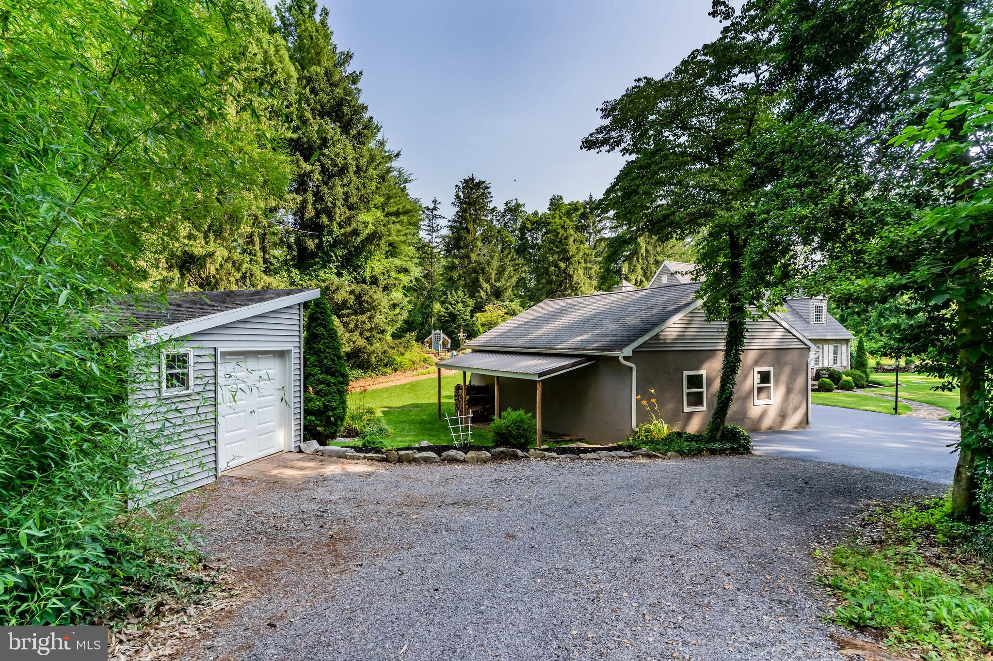 2123 Ritner Highway Carlisle, PA 17015 - Photo 64 of 72 Overhang behind garage for storage of firewood