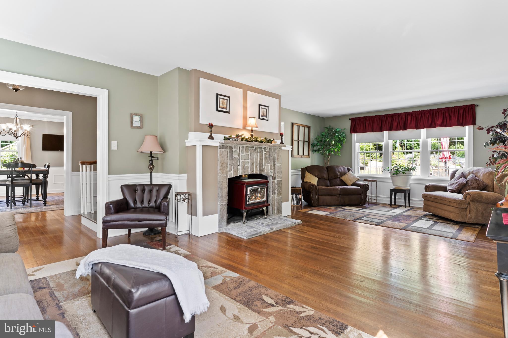 2123 Ritner Highway Carlisle, PA 17015 - Photo 7 of 72 Expansive living room with woodstove & mantle