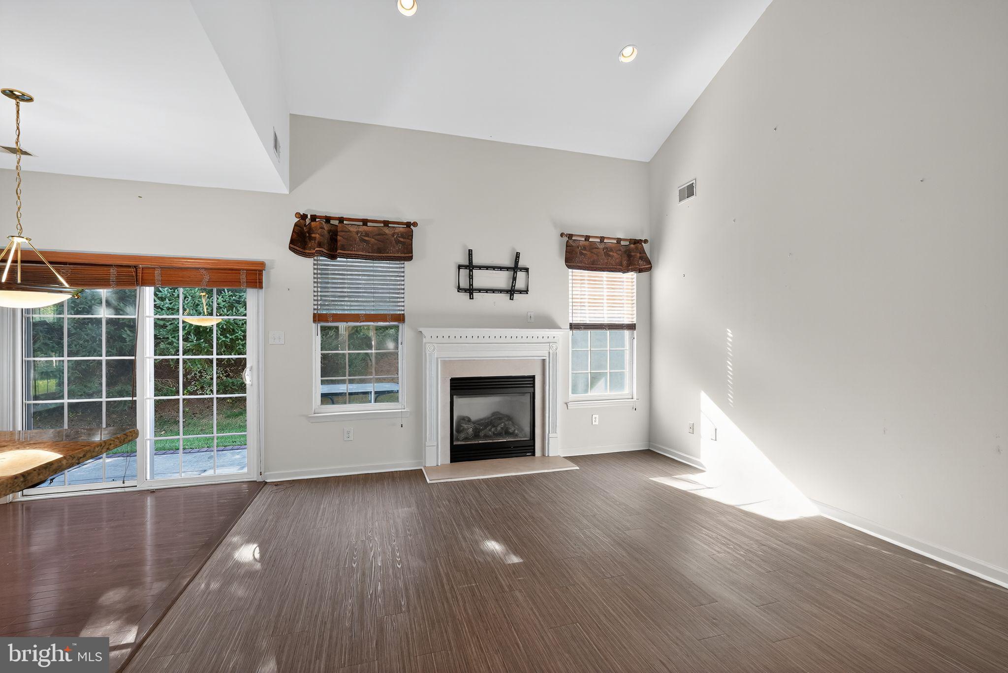 137 Stoyer Road Coatesville, PA 19320 - Photo 11 of 21 a view of a livingroom with a fireplace and window