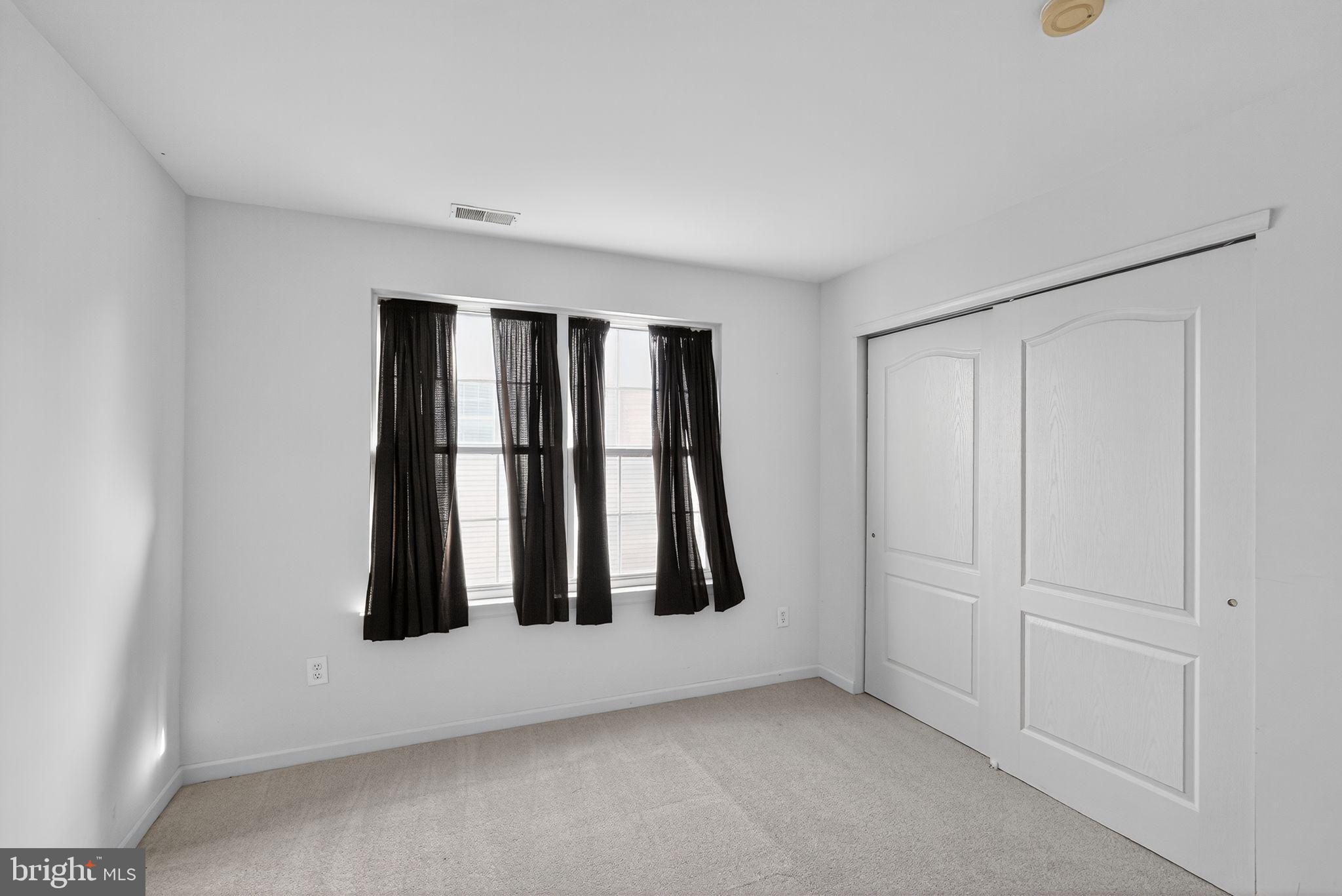 137 Stoyer Road Coatesville, PA 19320 - Photo 19 of 21 an empty room with windows