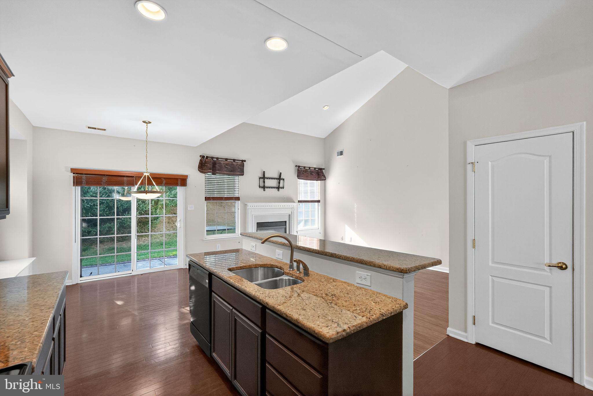 137 Stoyer Road Coatesville, PA 19320 - Photo 8 of 21 a kitchen with granite countertop a sink stove and cabinets