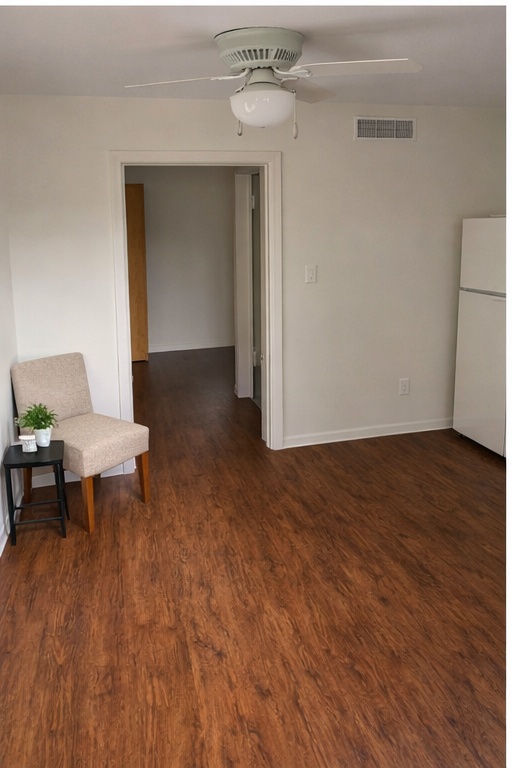 706 Denson Drive Austin, TX 78752 - Photo 2 of 5 a view of livingroom with furniture and wooden floor