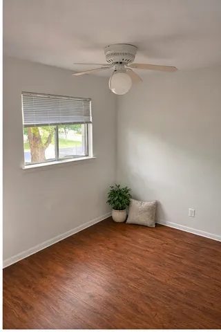 a view of an empty room and window