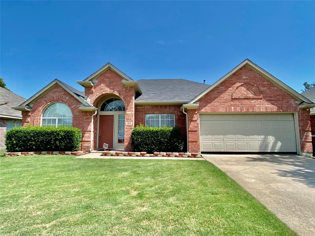 813 Snapdragon Lane Plano, TX 75075 - Photo 1 of 1 a front view of a house with a yard