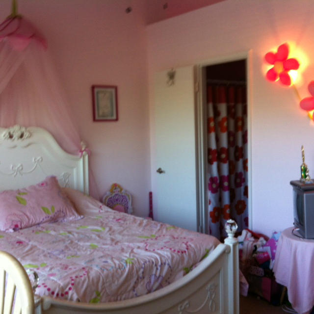 1068 Jeffery Street Boca Raton, FL 33487 - Photo 11 of 13 a bedroom with a bed and a window