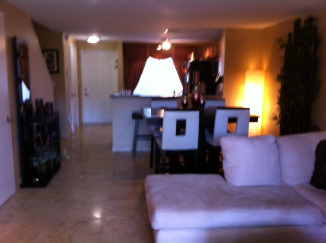 1068 Jeffery Street Boca Raton, FL 33487 - Photo 3 of 13 a living room with furniture and a flat screen tv